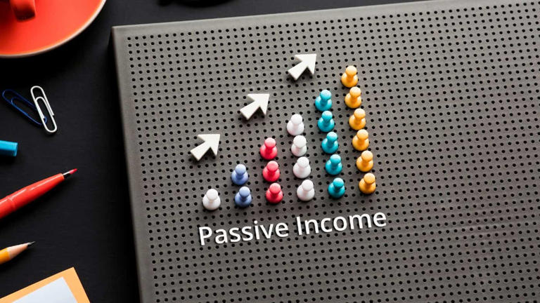 Passive income text with pin graph chart on business table Passive income text with pin graph chart on business table